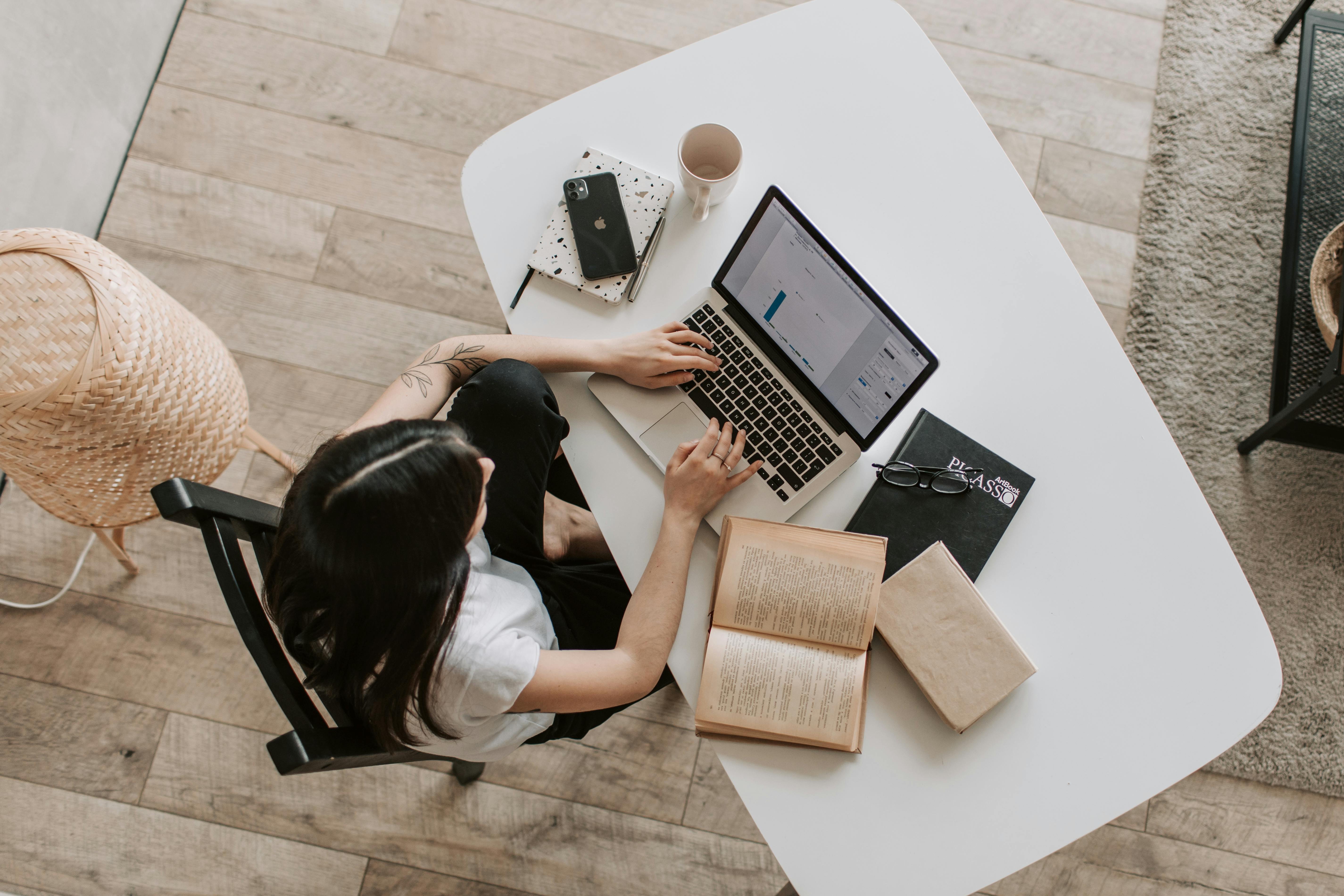 Person using laptop for productivity tasks