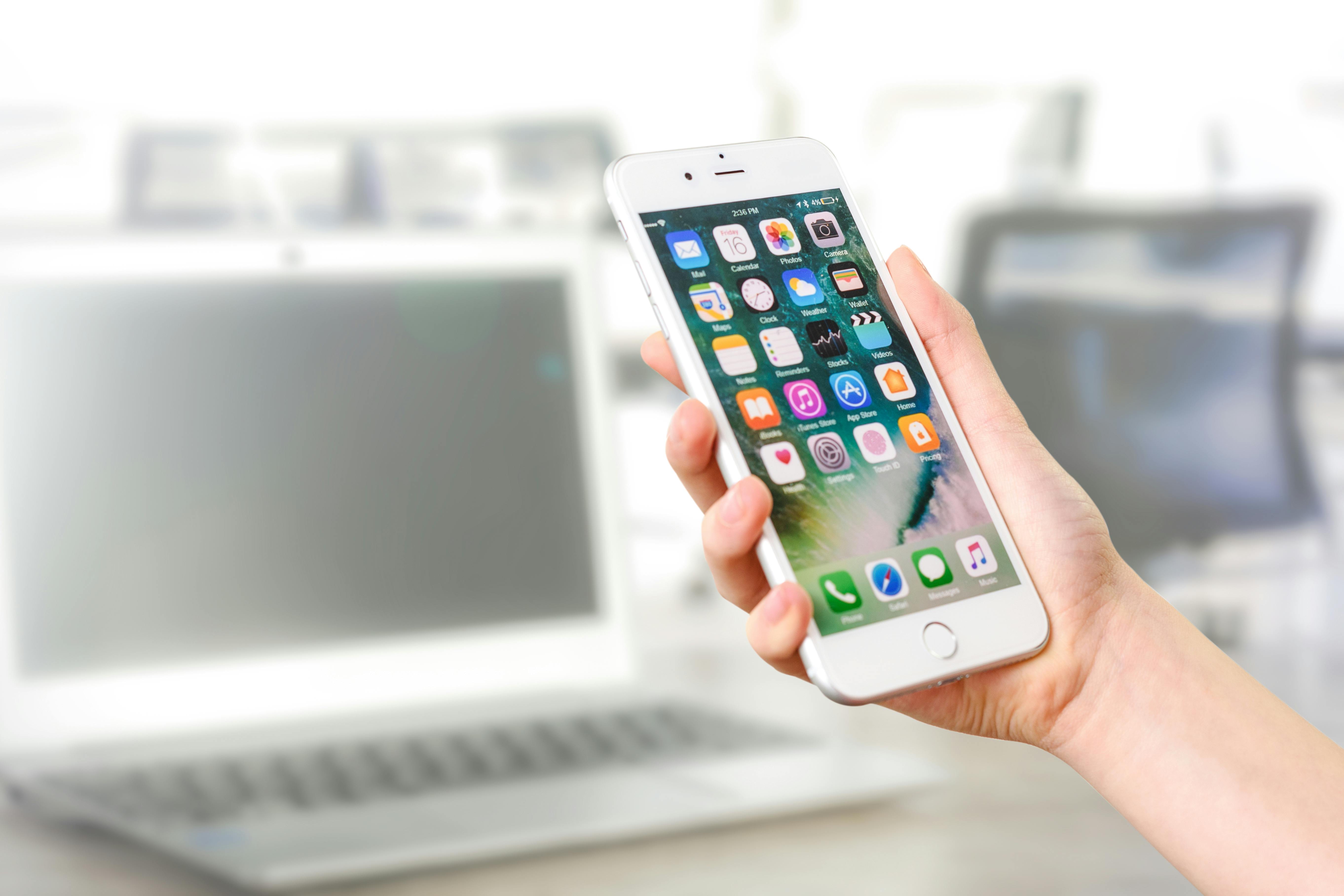 Smartphone showing Telegram app with chat list