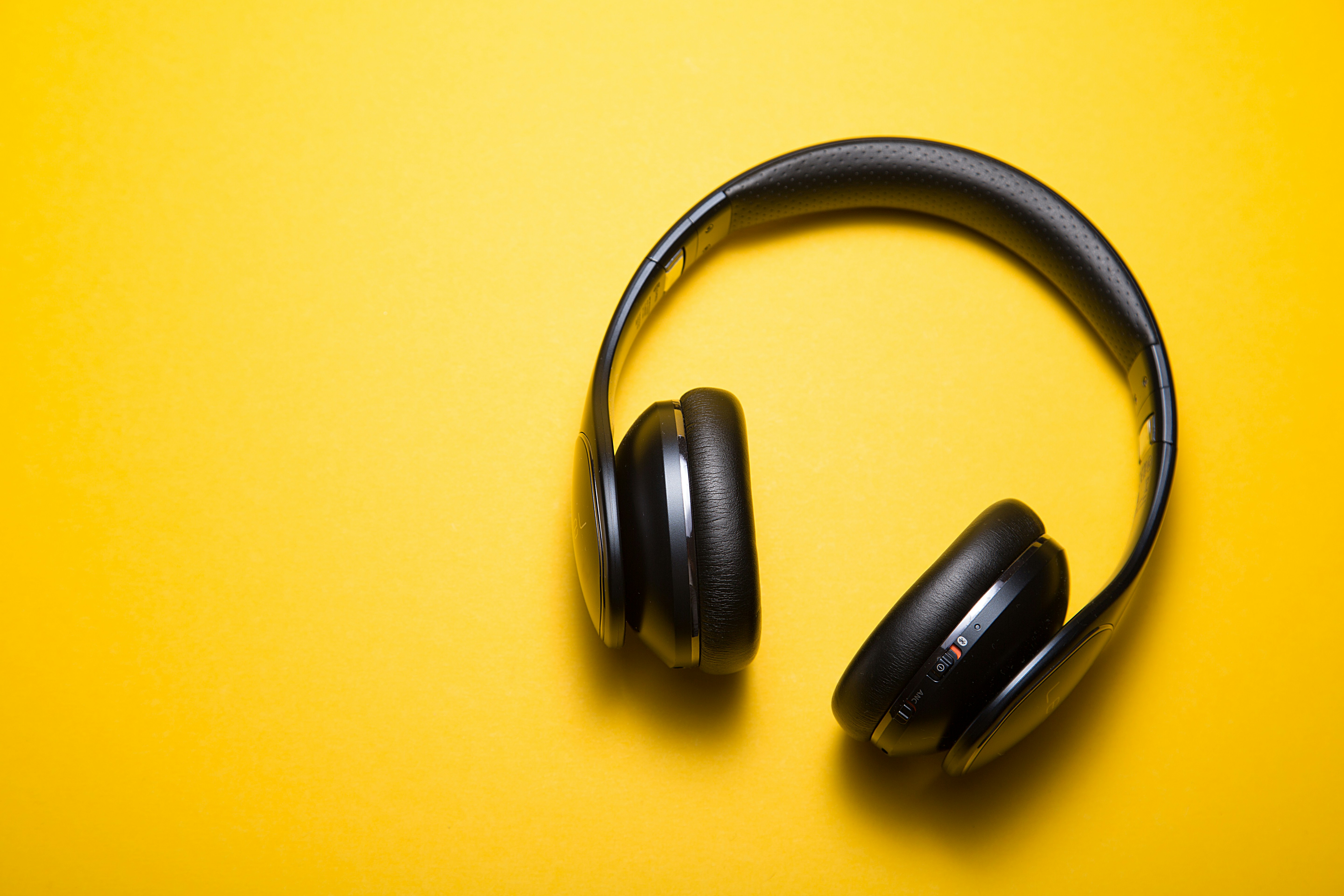 Headphones in yellow background